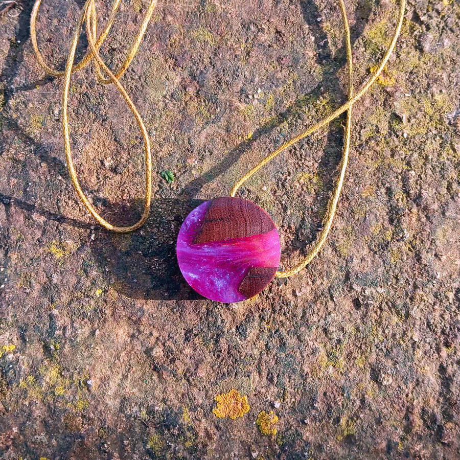 Driftwood with metallic pink resin