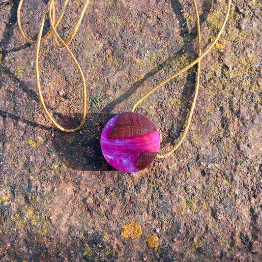 Driftwood with metallic pink resin