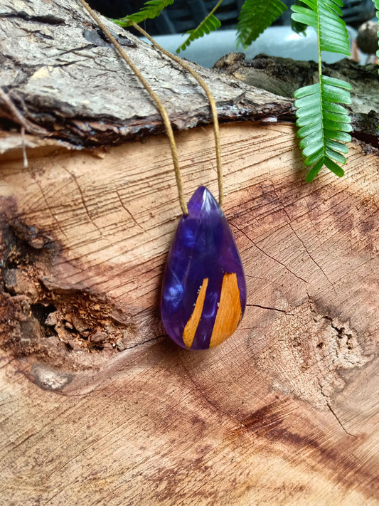 Driftwood with metallic purple resin