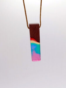 Driftwood with rainbow coloured resin