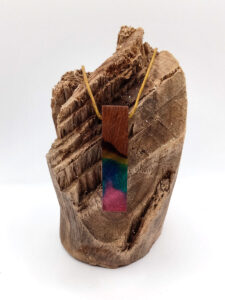 Driftwood with rainbow coloured resin