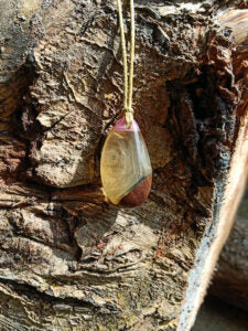 Driftwood with white and pink resin