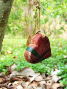 Driftwood with metallic red and green resin lines