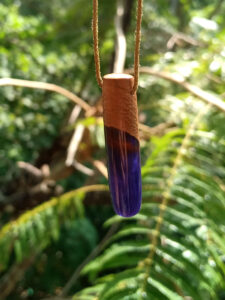 Driftwood with metallic purple resin