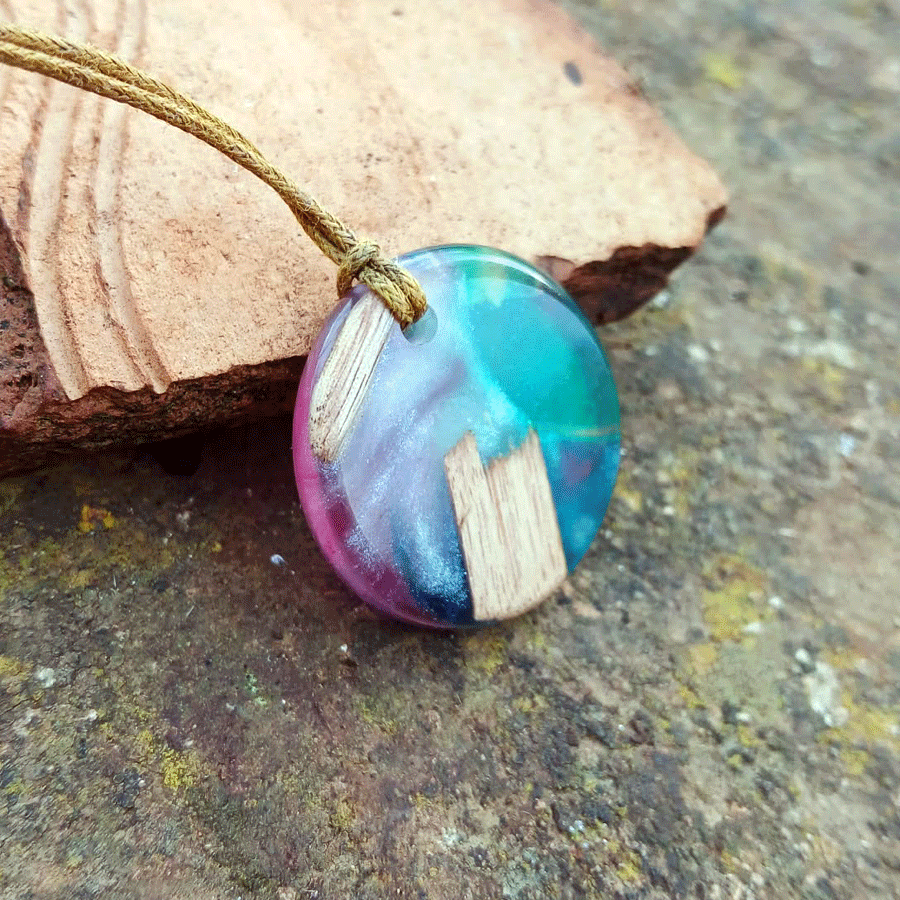 Driftwood with transparent turquoise and pink resin