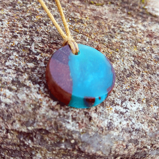 Driftwood with metallic turquoise resin