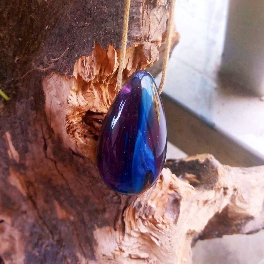 Driftwood with blue and purple resin