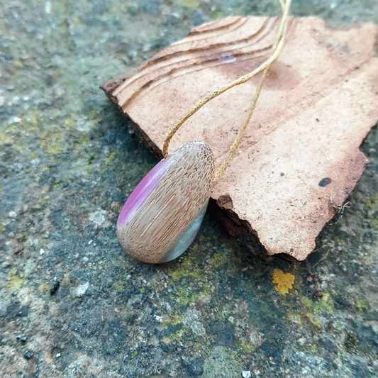 Driftwood with metallic pearl and pink resin