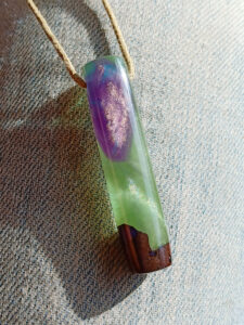 Driftwood with metallic green and purple resin