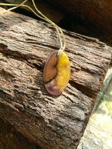 Driftwood with metallic yellow and purple resin