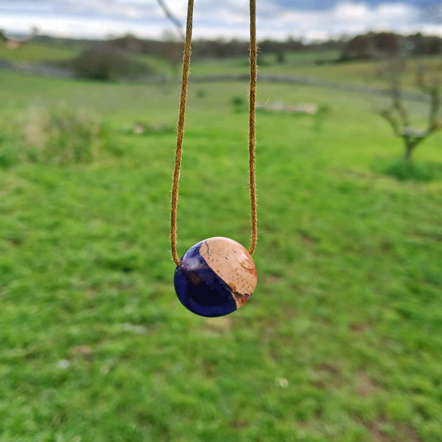 Driftwood with metallic purple resin