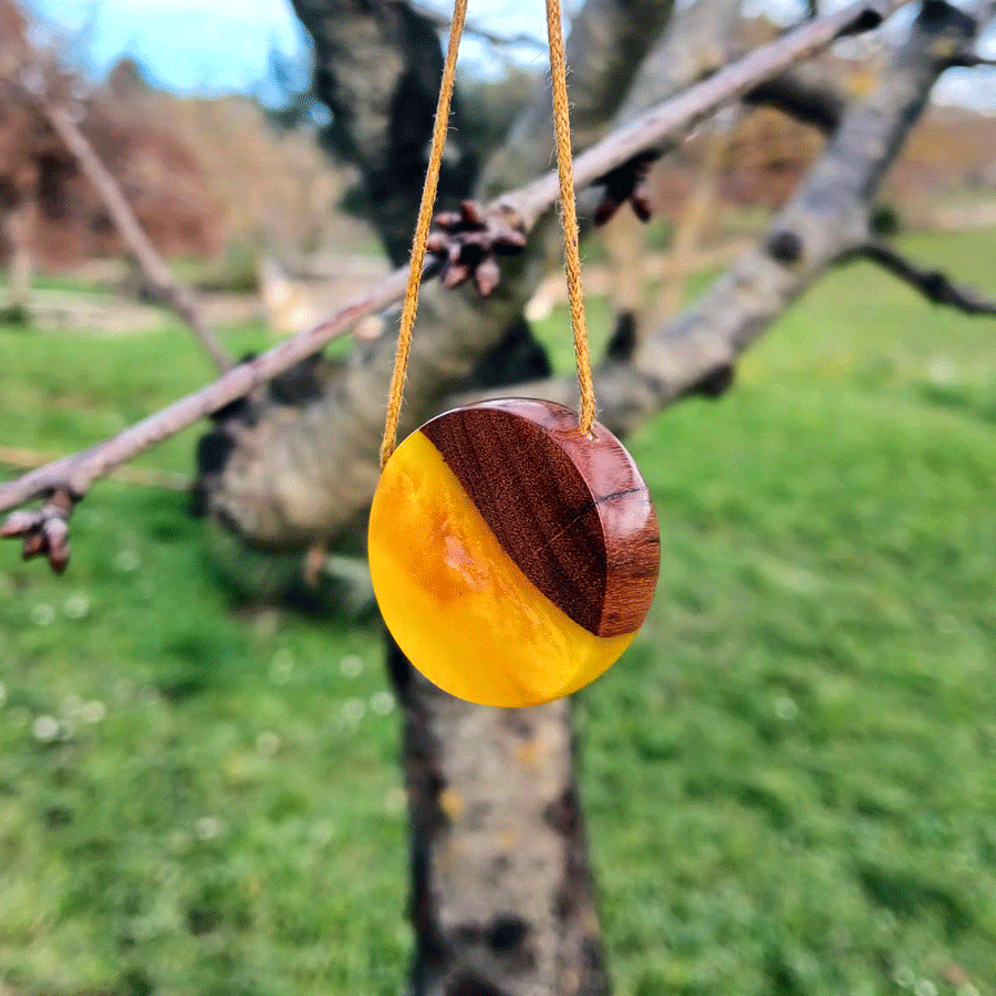 Driftwood with metallic yellow resin