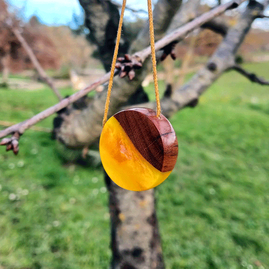 Driftwood with metallic yellow resin