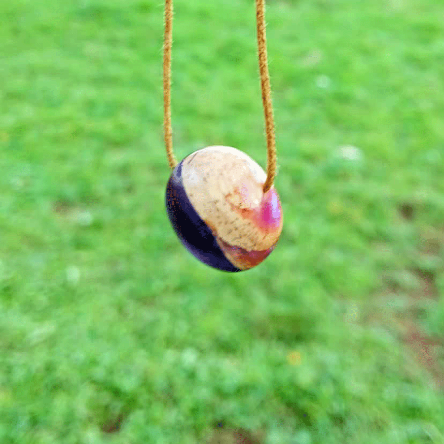 Driftwood with metallic purple resin