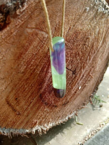 Driftwood with metallic green and purple resin