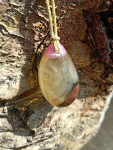 Driftwood with white and pink resin