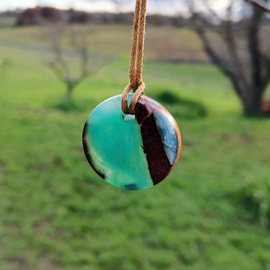 Driftwood with metallic turquoise resin