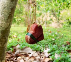 Driftwood with metallic red and green resin lines