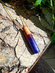 Driftwood with metallic purple resin