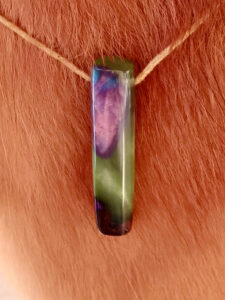 Driftwood with metallic green and purple resin