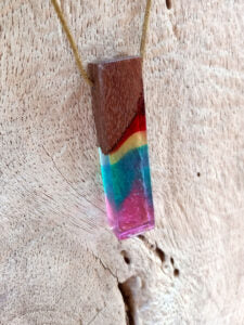 Driftwood with rainbow coloured resin