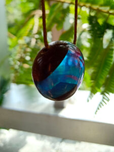 Driftwood with blue and pink resin