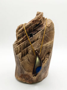 Driftwood with blue resin dot