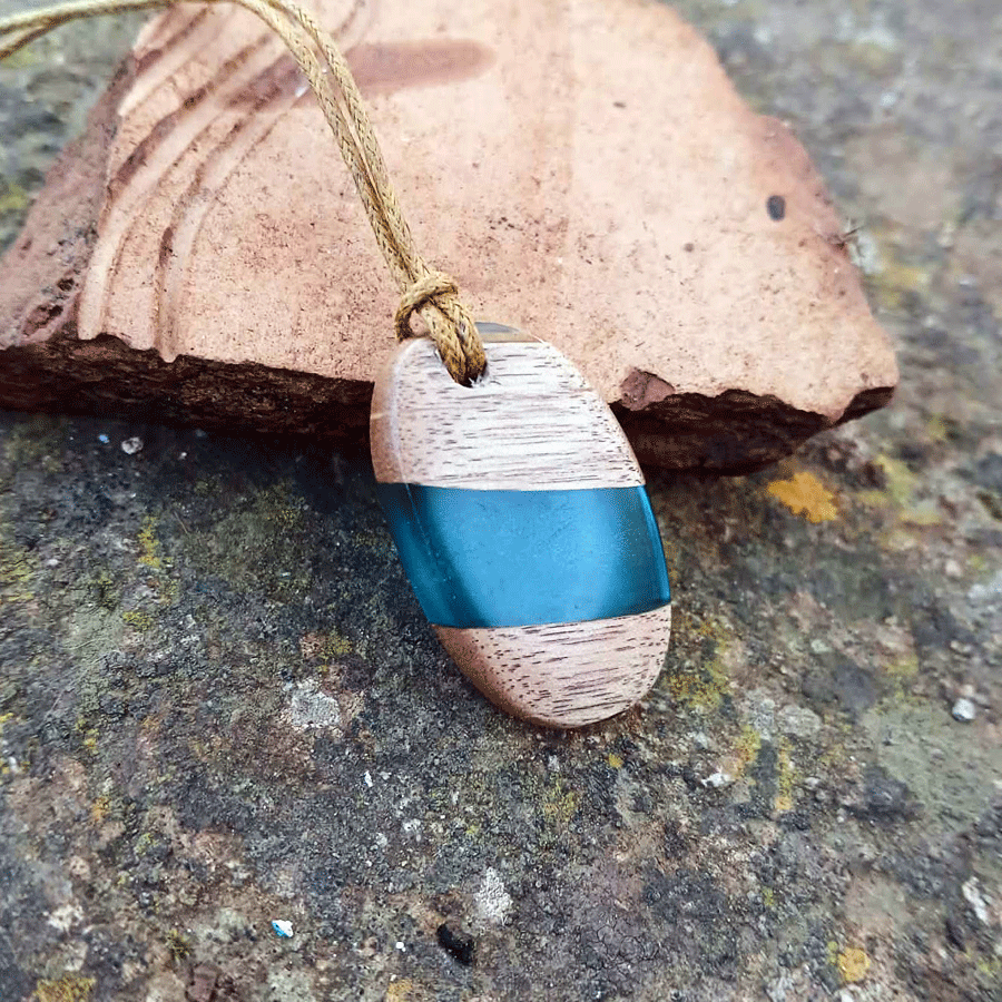 Driftwood with transparent blue resin