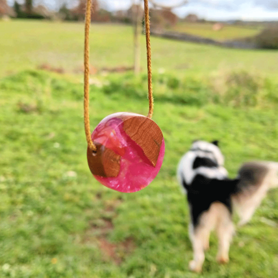 Driftwood with metallic pink resin
