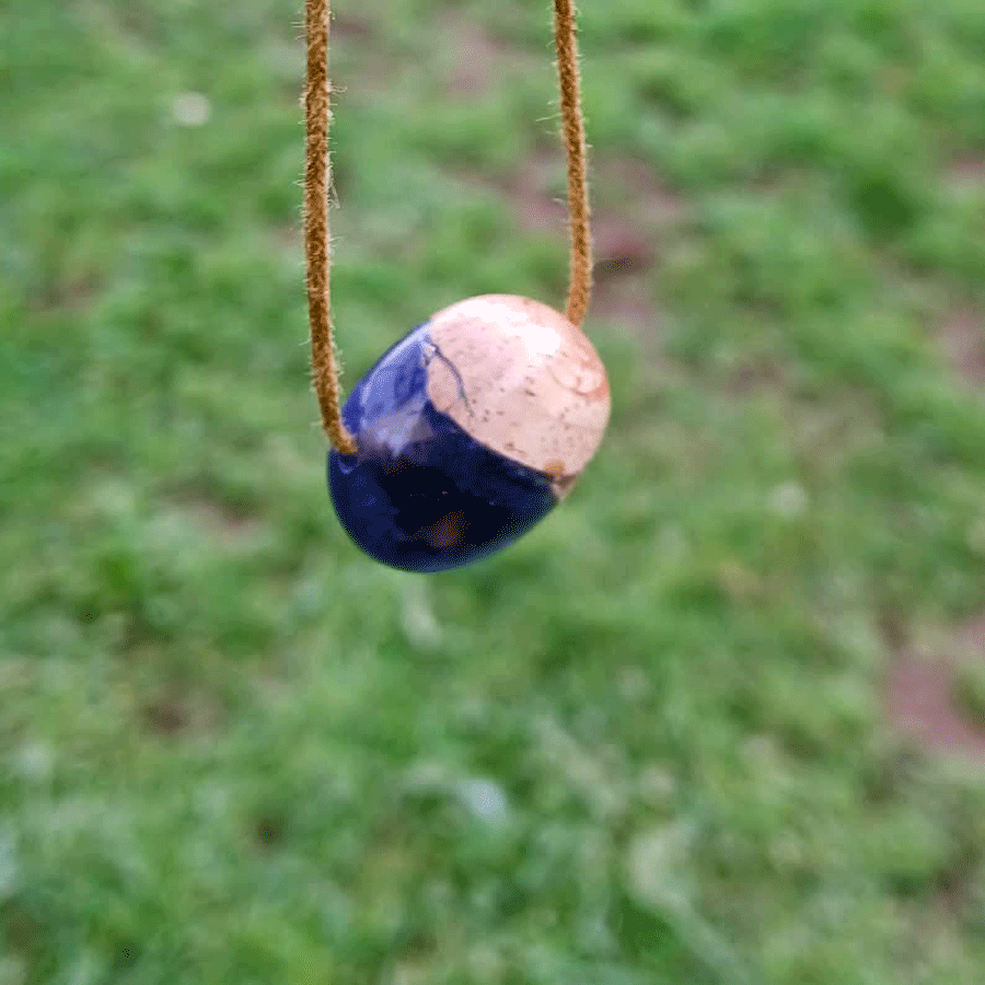 Driftwood with metallic purple resin