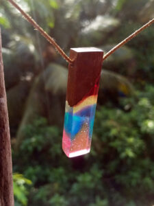 Driftwood with rainbow coloured resin