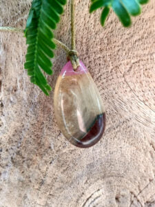 Driftwood with white and pink resin