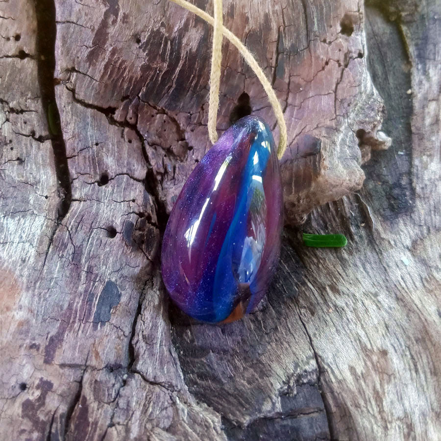 Driftwood with blue and purple resin