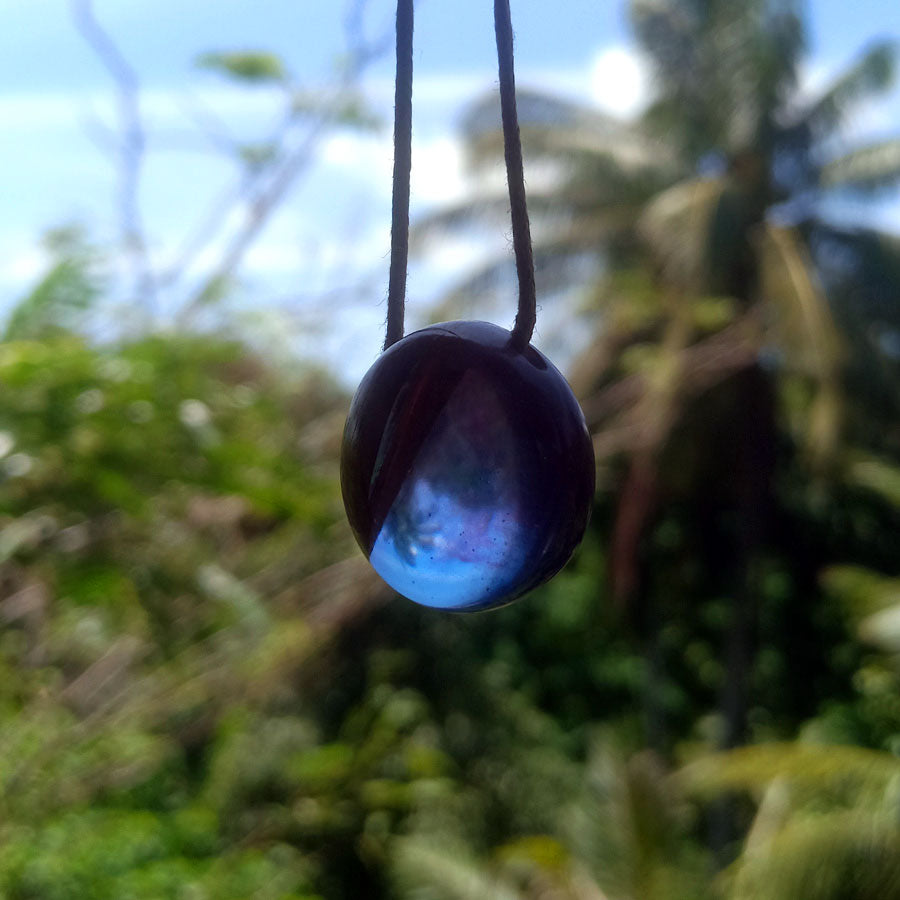 Driftwood with blue and purple resin