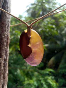 Driftwood with metallic yellow and purple resin