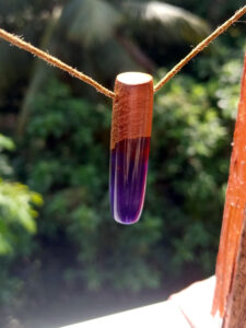 Driftwood with metallic purple resin