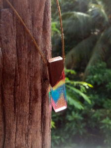 Driftwood with rainbow coloured resin