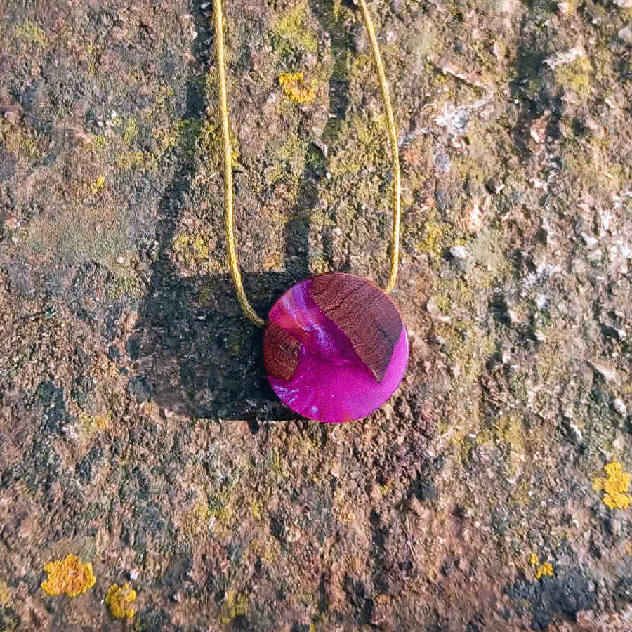 Driftwood with metallic pink resin