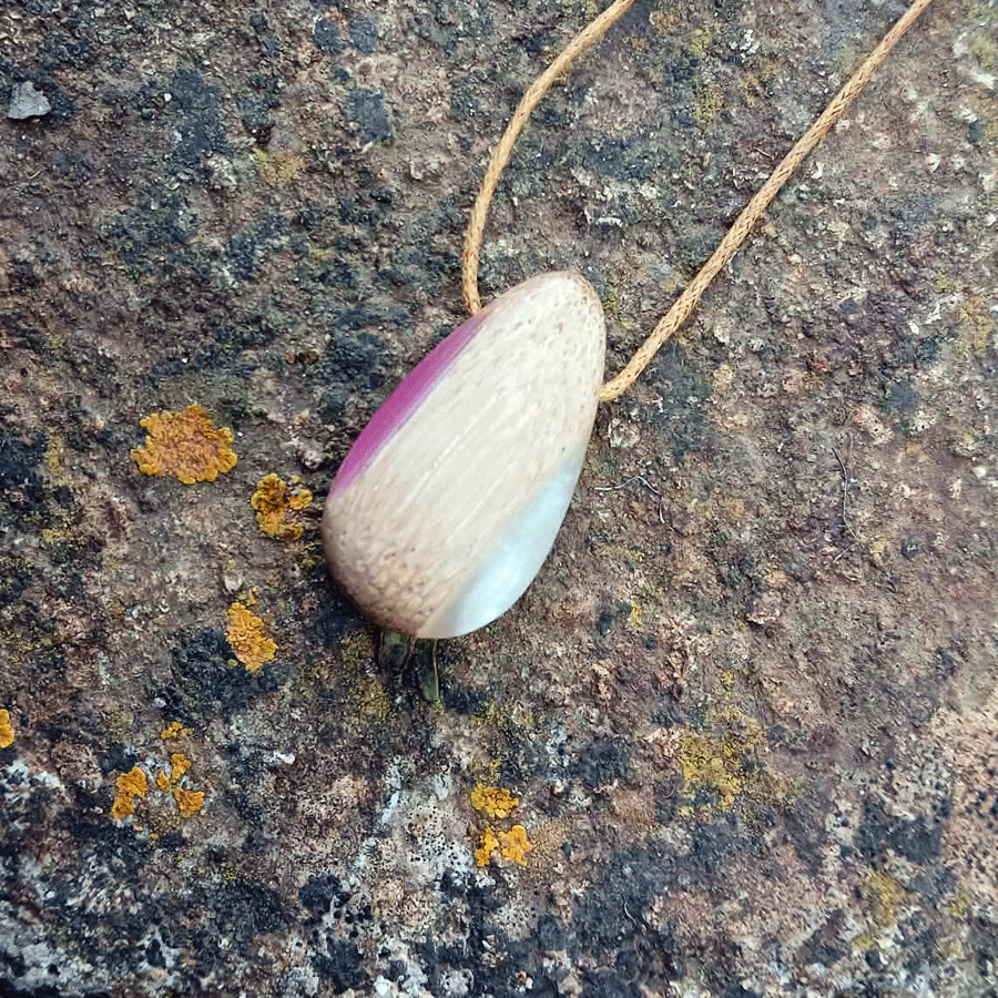 Driftwood with metallic pearl and pink resin