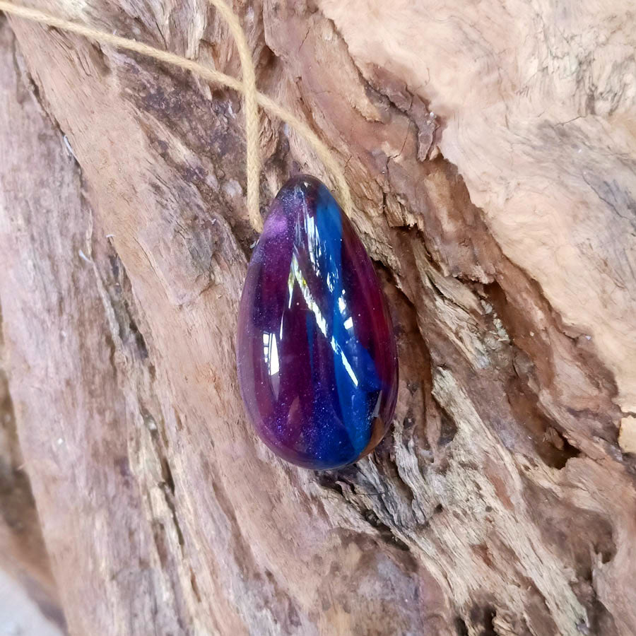 Driftwood with blue and purple resin