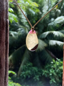 Driftwood with white and pink resin