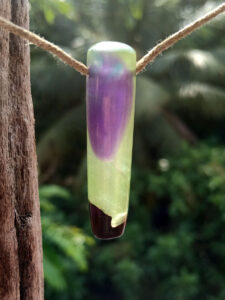 Driftwood with metallic green and purple resin