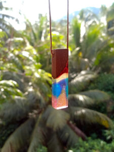 Driftwood with rainbow coloured resin