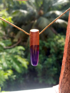 Driftwood with metallic purple resin