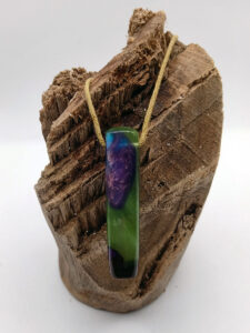 Driftwood with metallic green and purple resin