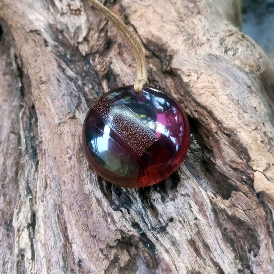 Driftwood with purple and turquoise resin