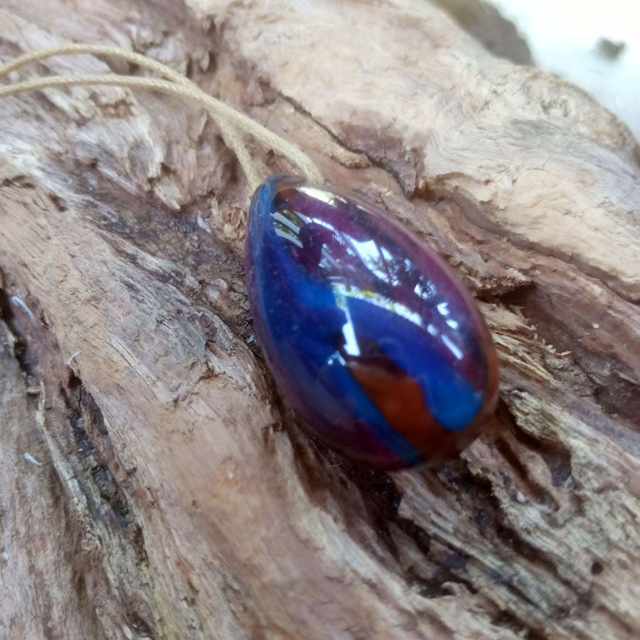 Driftwood with blue and purple resin