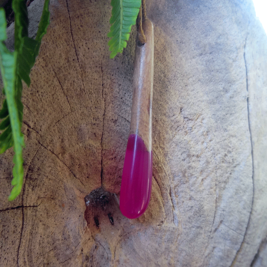 Driftwood with bright pink resin