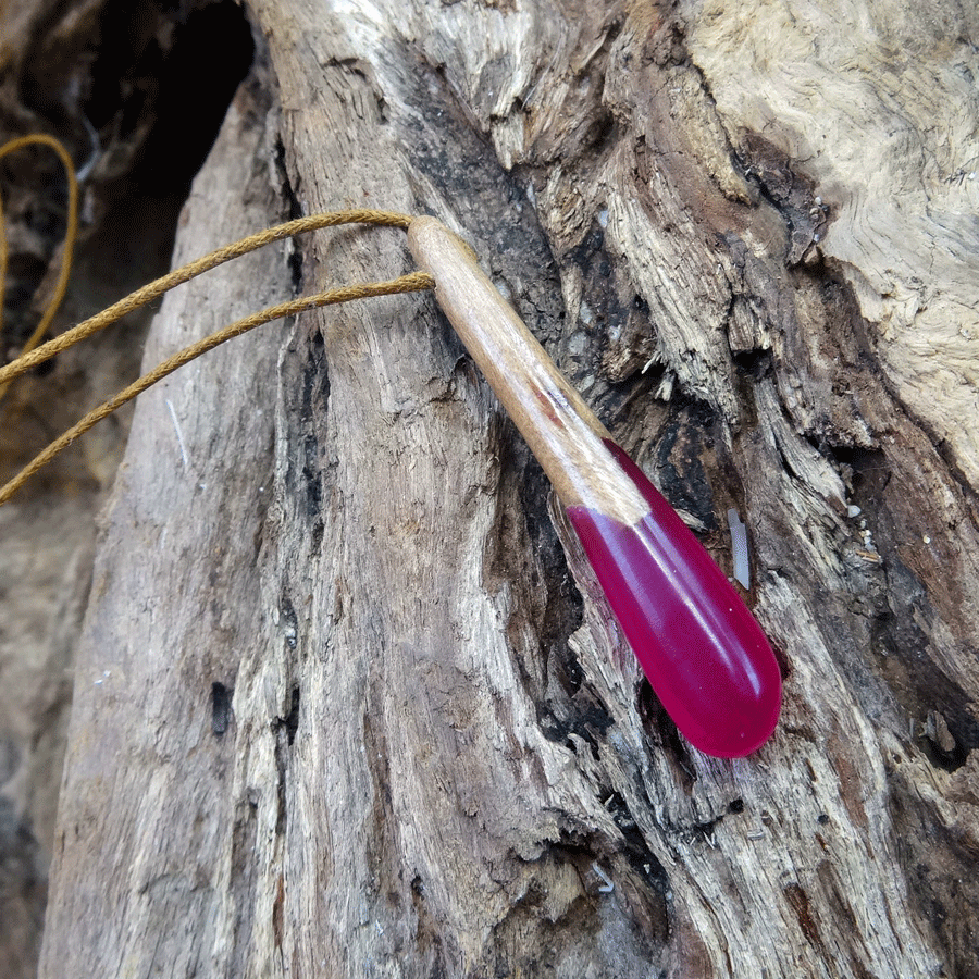 Driftwood with bright pink resin