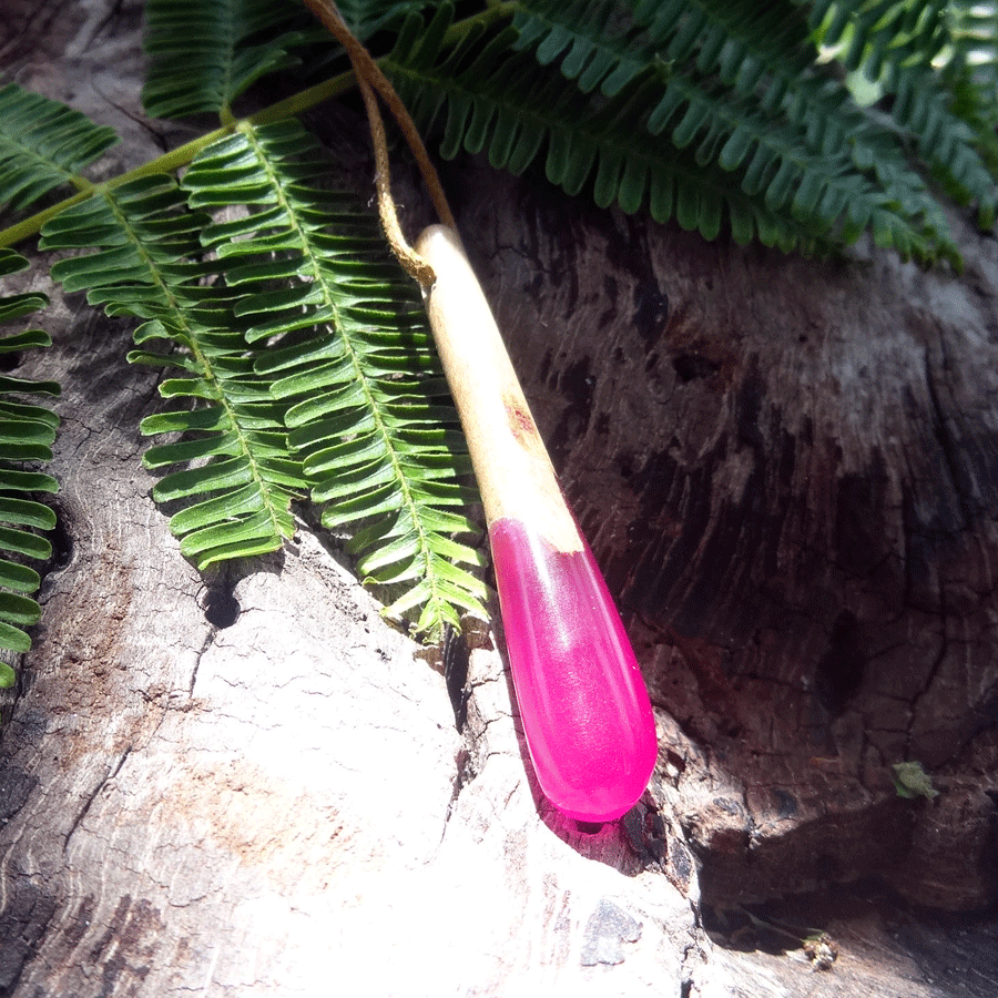 Driftwood with bright pink resin